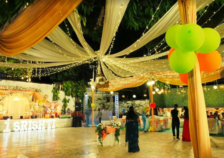 Couple walking through sparks and confetti as guests watch